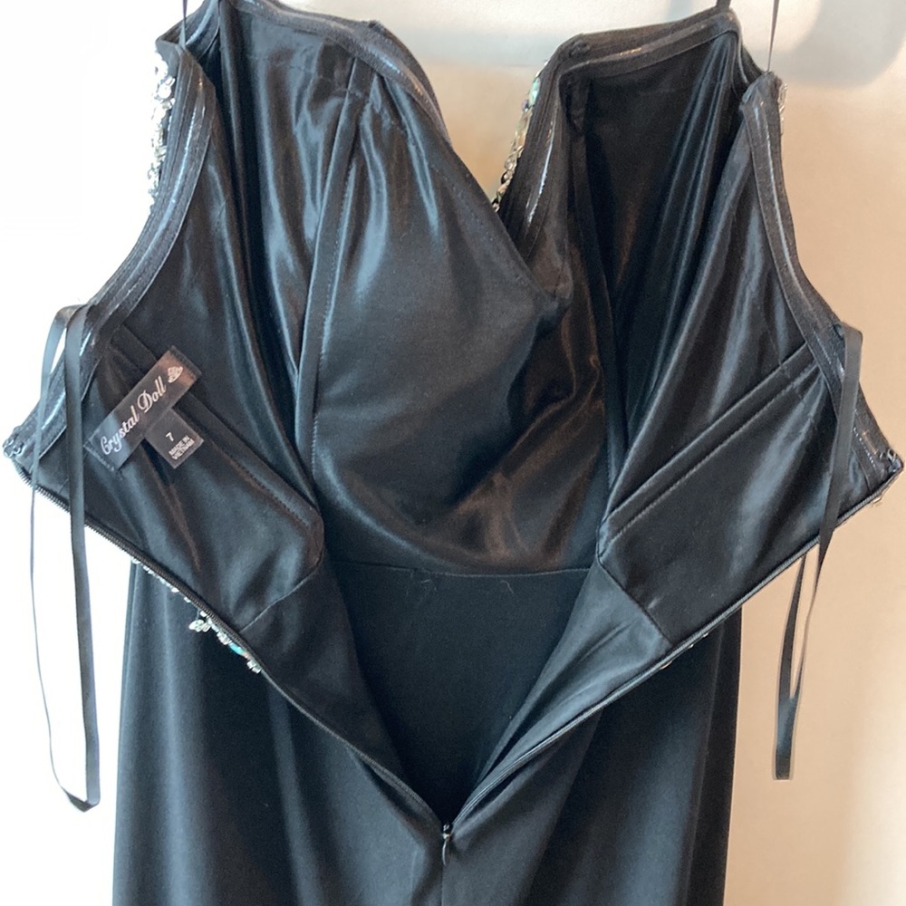 Long bejeweled black prom dress with thin straps and slit up to the thigh. - Picture 8 of 12